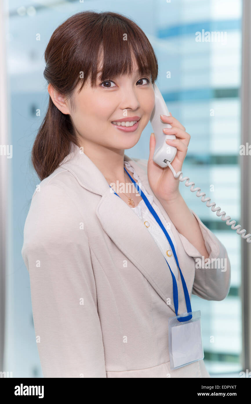 Businesswoman Answering the Phone Stock Photo