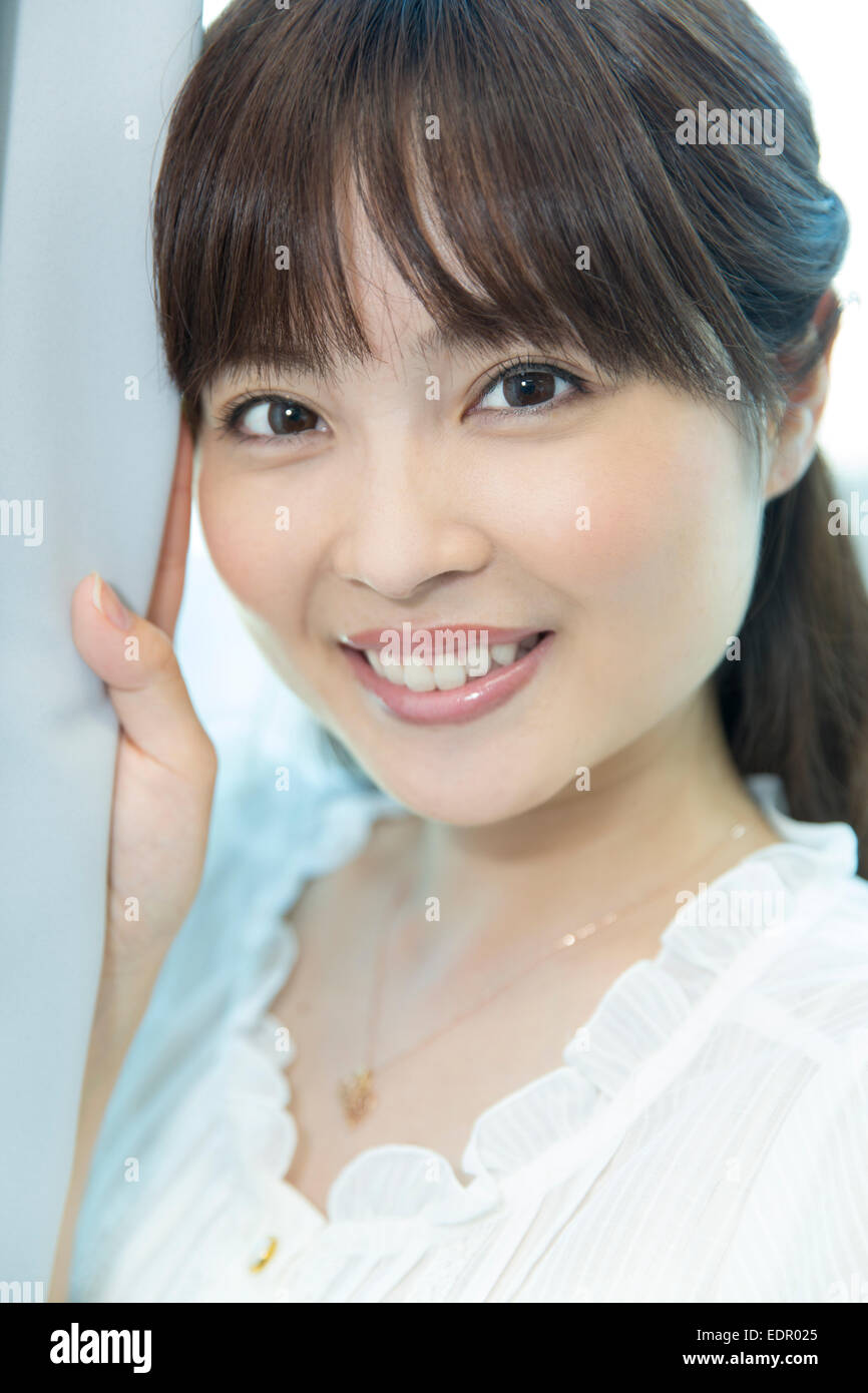 Smiling japanese woman hi-res stock photography and images - Alamy