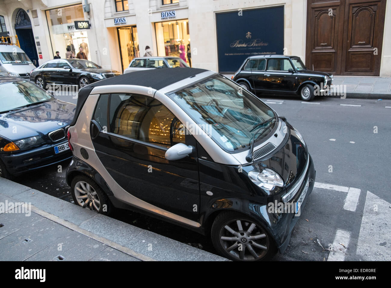 Small,easy to park micro,mini,car,cars, parked in limited space along Rue  St Honore, a fashionable,up-market shopping street in centre, 1,Paris Stock  Photo - Alamy
