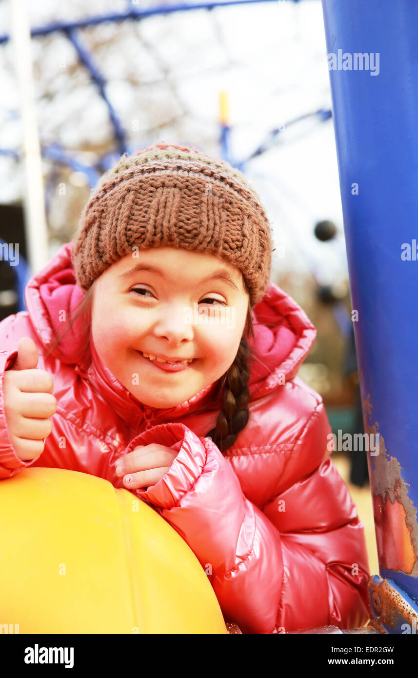 Portrait of beautiful girl on the playground Stock Photo - Alamy
