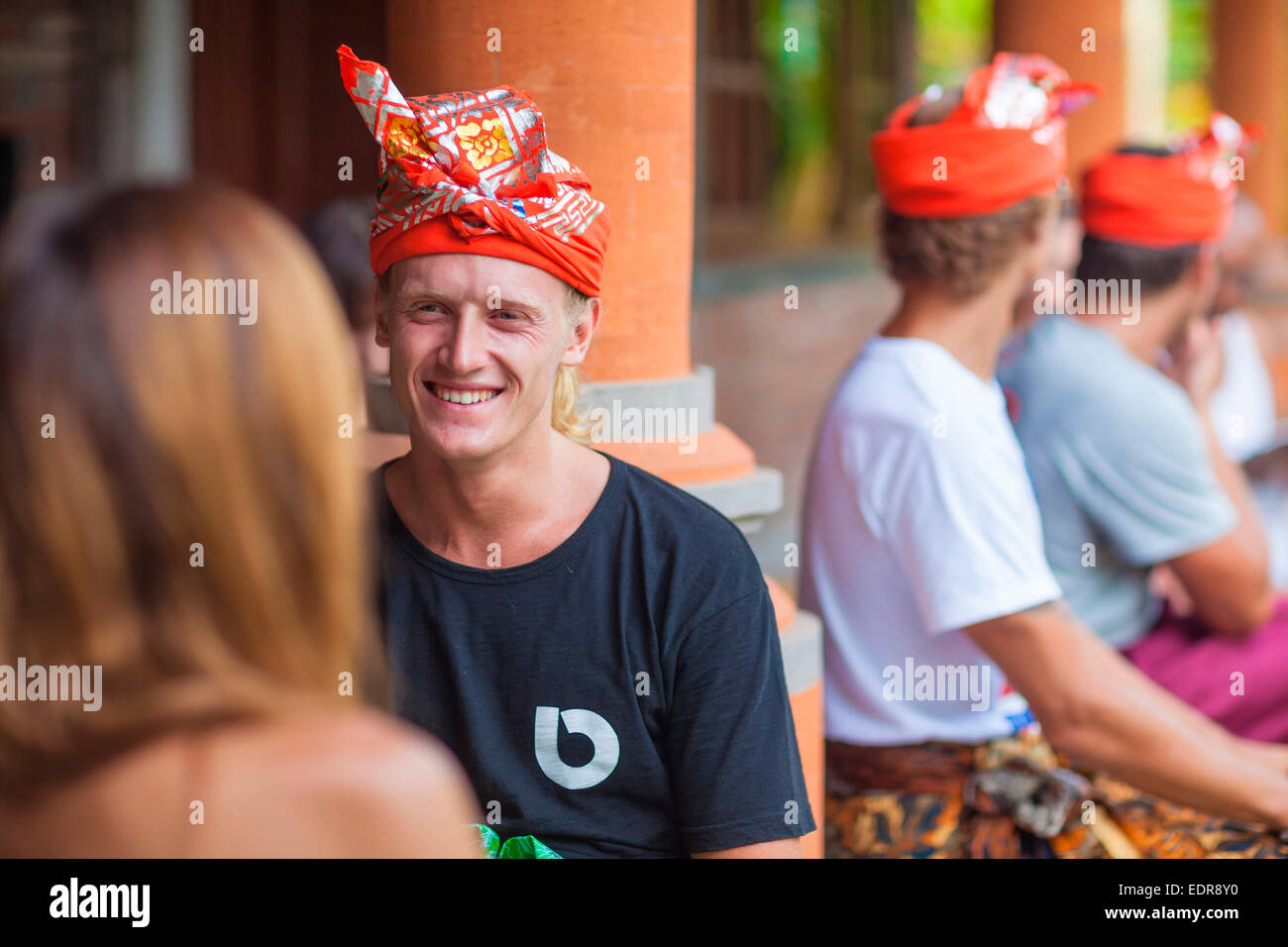 A man  wearing traditional head dress in Ubud, Denpasar, Bali, Indonesia Stock Photo