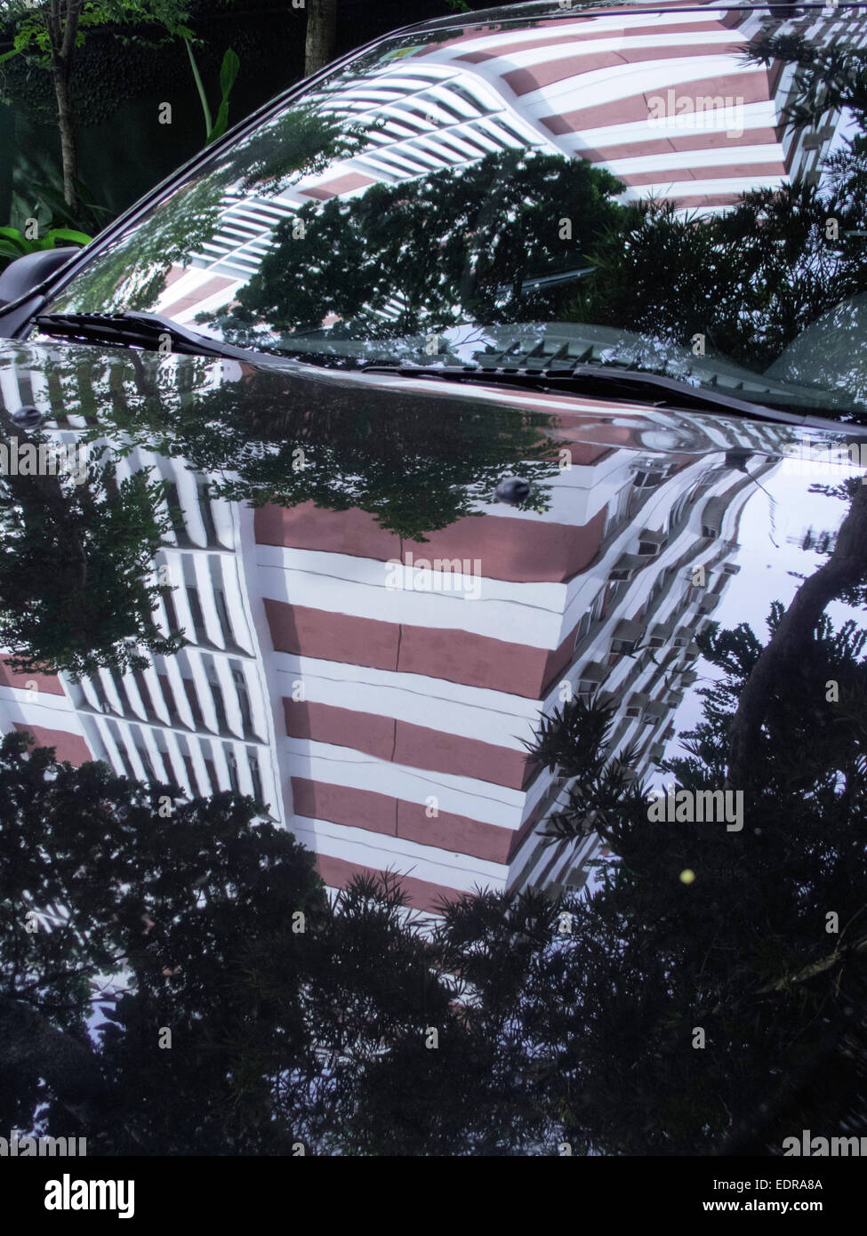 Reflection of building on car bonnet, Gávea, Rio De Janerio, Brazil. Stock Photo