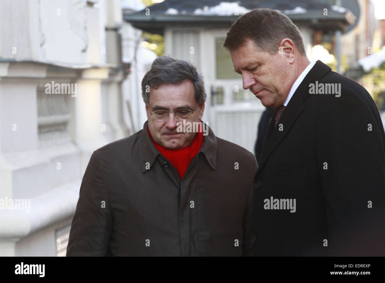 Bucharest, Romania. 8th Jan, 2015. Romanian President Klaus Iohannis, accompanied by the French ambassador, pays his condolence to the victims of the shooting at the office of 'Charlie Hebdo' magazine, at the French embassy in Bucharest Jan. 8, 2015. Credit:  Gabriel Petrescu/Xinhua/Alamy Live News Stock Photo