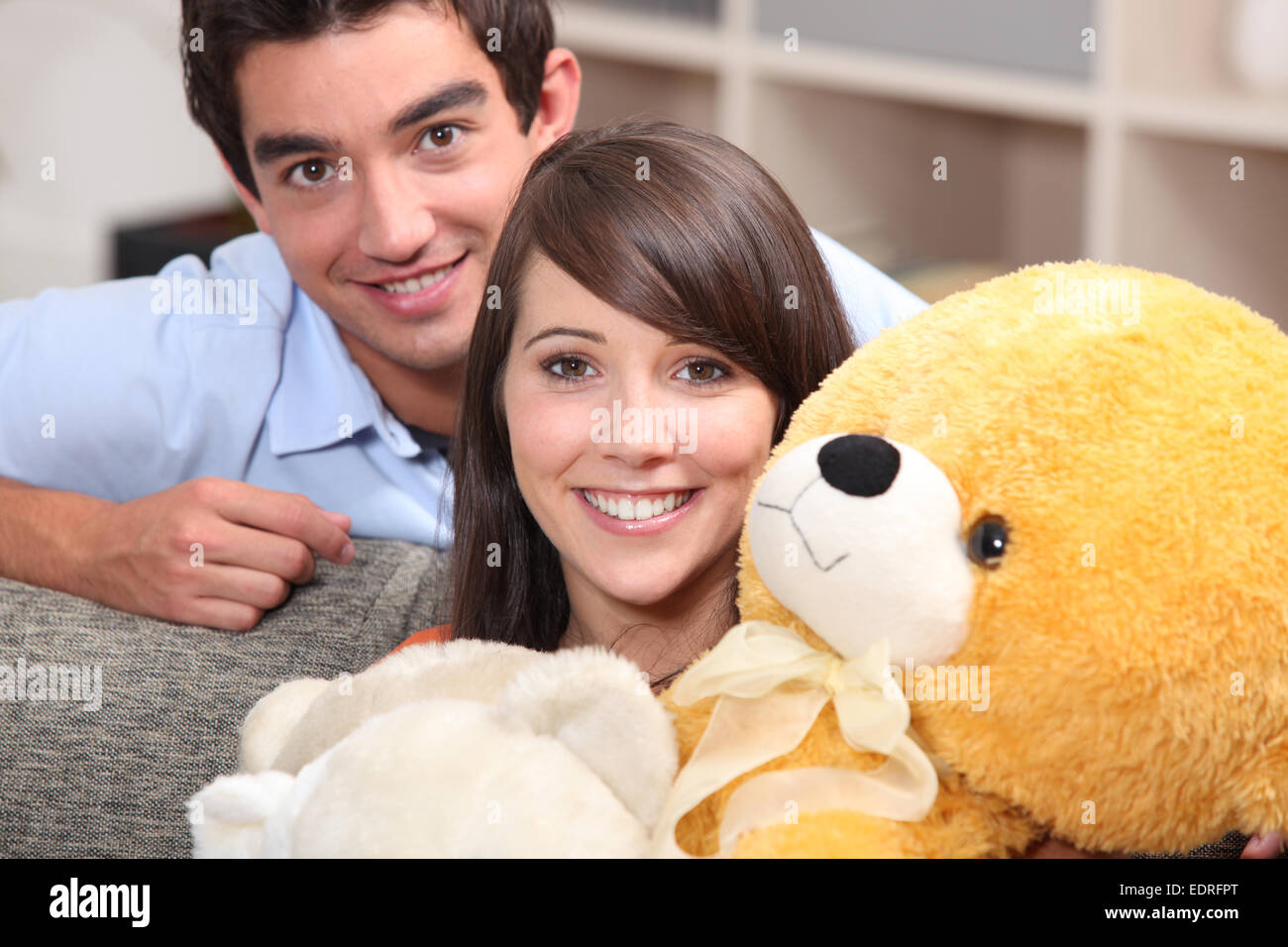 Teenage girl teddy sofa hi-res stock photography and images - Alamy