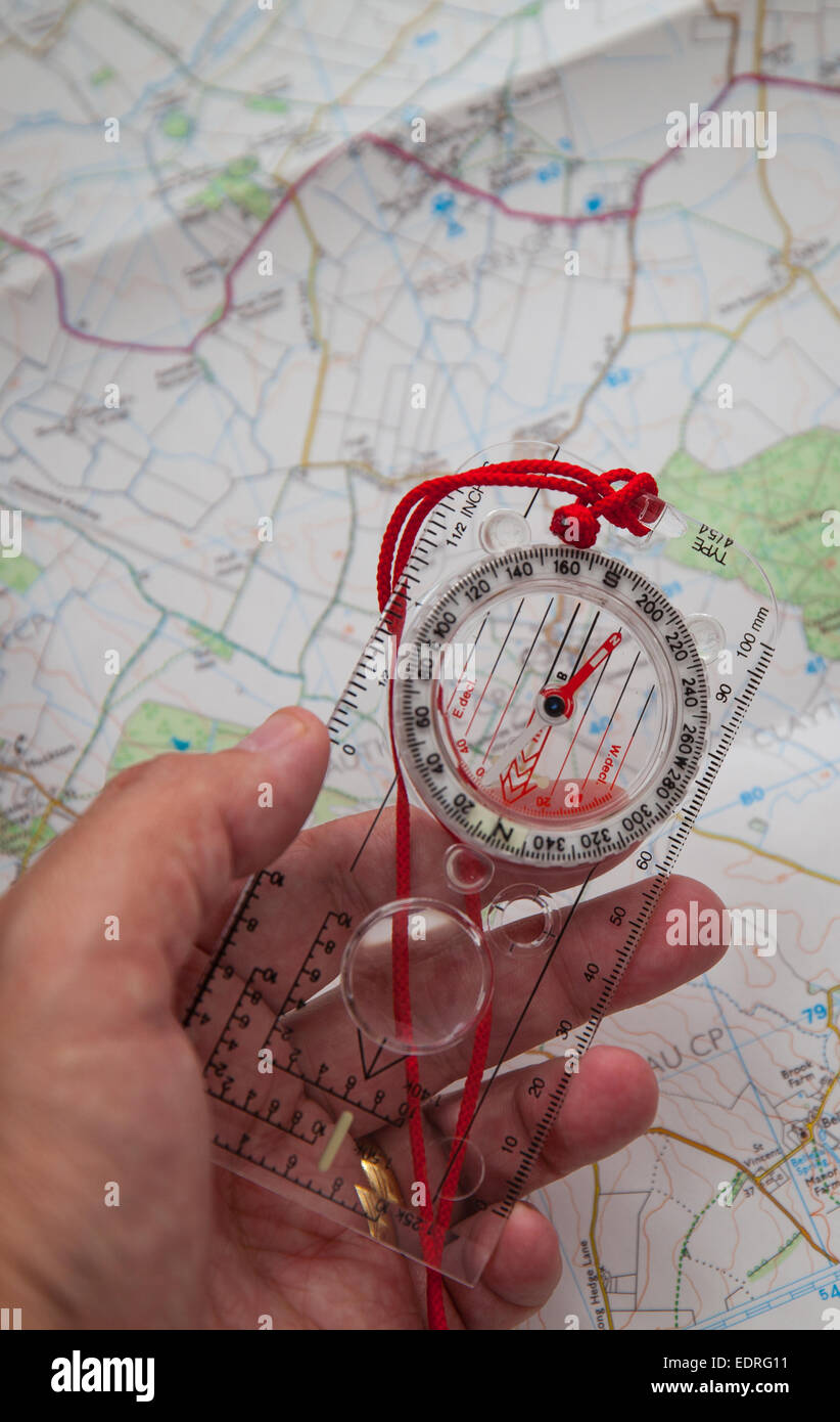 Shot of Orienteering compass on string Stock Photo