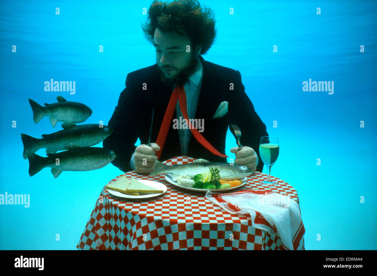 Man eating fish Stock Photo - Alamy