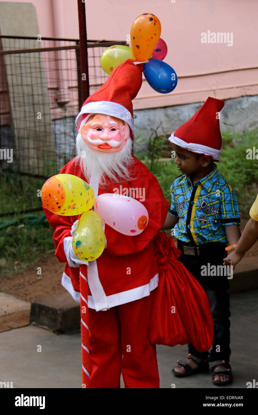 school kids celebrating christmas in kerala,india wearing santa clause costume Stock Photo
