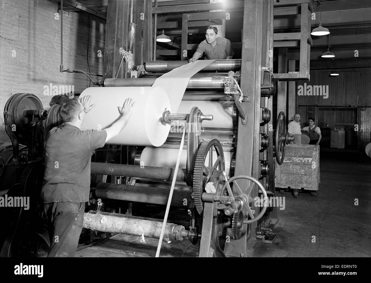 Mt. Holyoke, Massachusetts Paper. American Writing Paper Co. Supercalender putting on roll