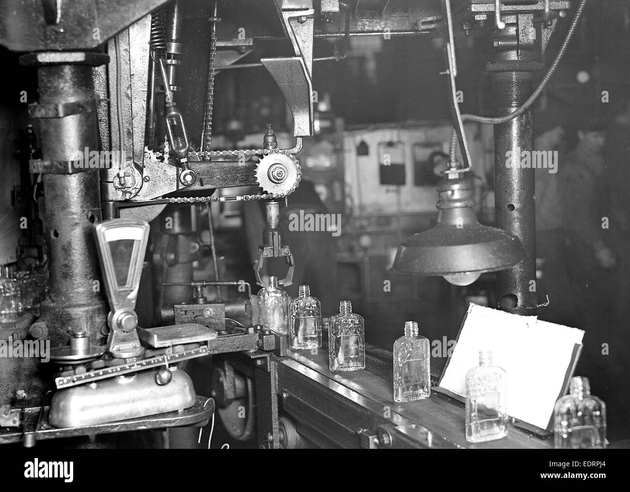 Millville, New Jersey Glass bottles. [Bottles moving along a conveyor