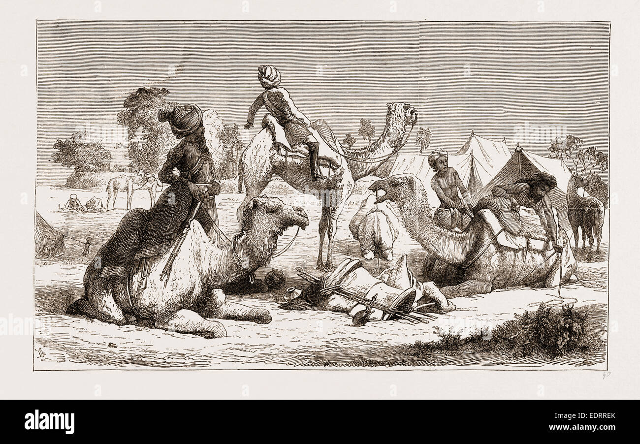 INDIA, CAMEL RIDERS OF A NATIVE CAVALRY REGIMENT PREPARING FOR A MARCH, 1876 Stock Photo