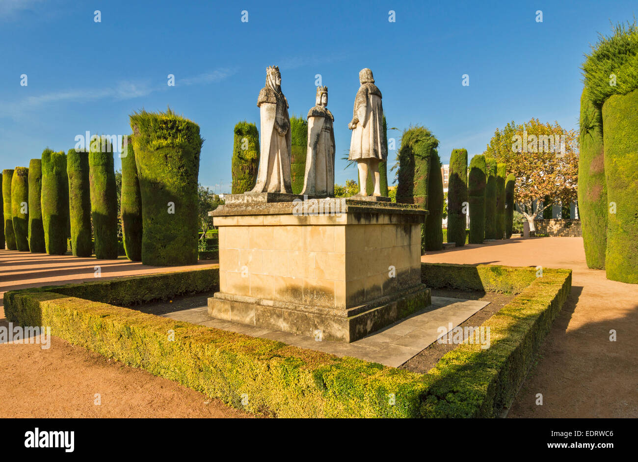 CORDOBA THE GARDEN OF THE ALCAZAR OF THE CHRISTIAN KINGS STATUES OF THE CATHOLIC KINGS AND COLUMBUS Stock Photo