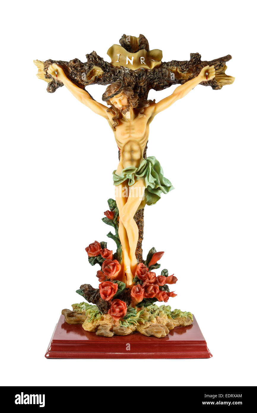 statue of jesus was transfixed on cross and rose at base on white background Stock Photo