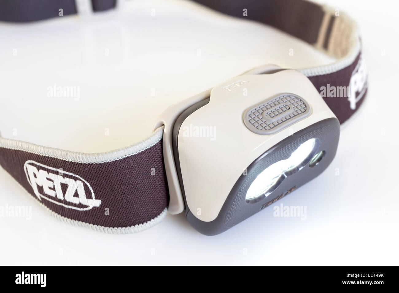 maternal Need Visiting grandparents A Petzl Tikka XP LED Head Torch on a White Background Stock Photo - Alamy