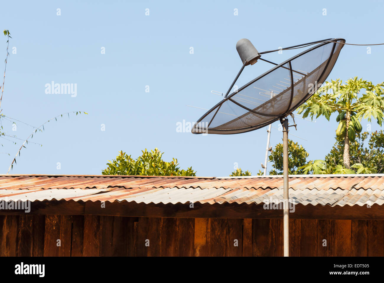 Old satellite dish and rural scene in Thailand Stock Photo