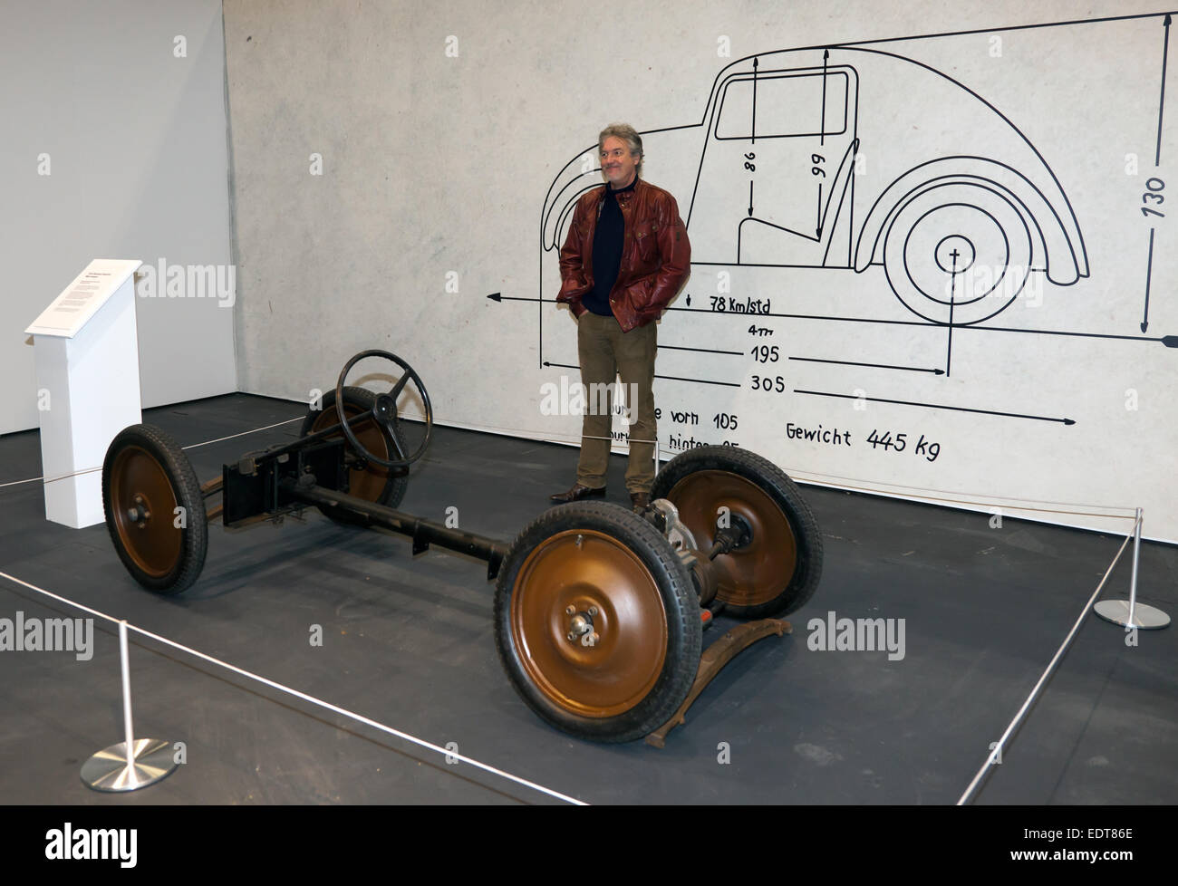James May,  at the opening of his special exhibit,  at the London  Classic Car Show. 'Cars that Changed the World'. James is posing  by the 1934 Standard Superior MkII Chassis designed by Josef Ganz and later used in the Volks Wagen Stock Photo