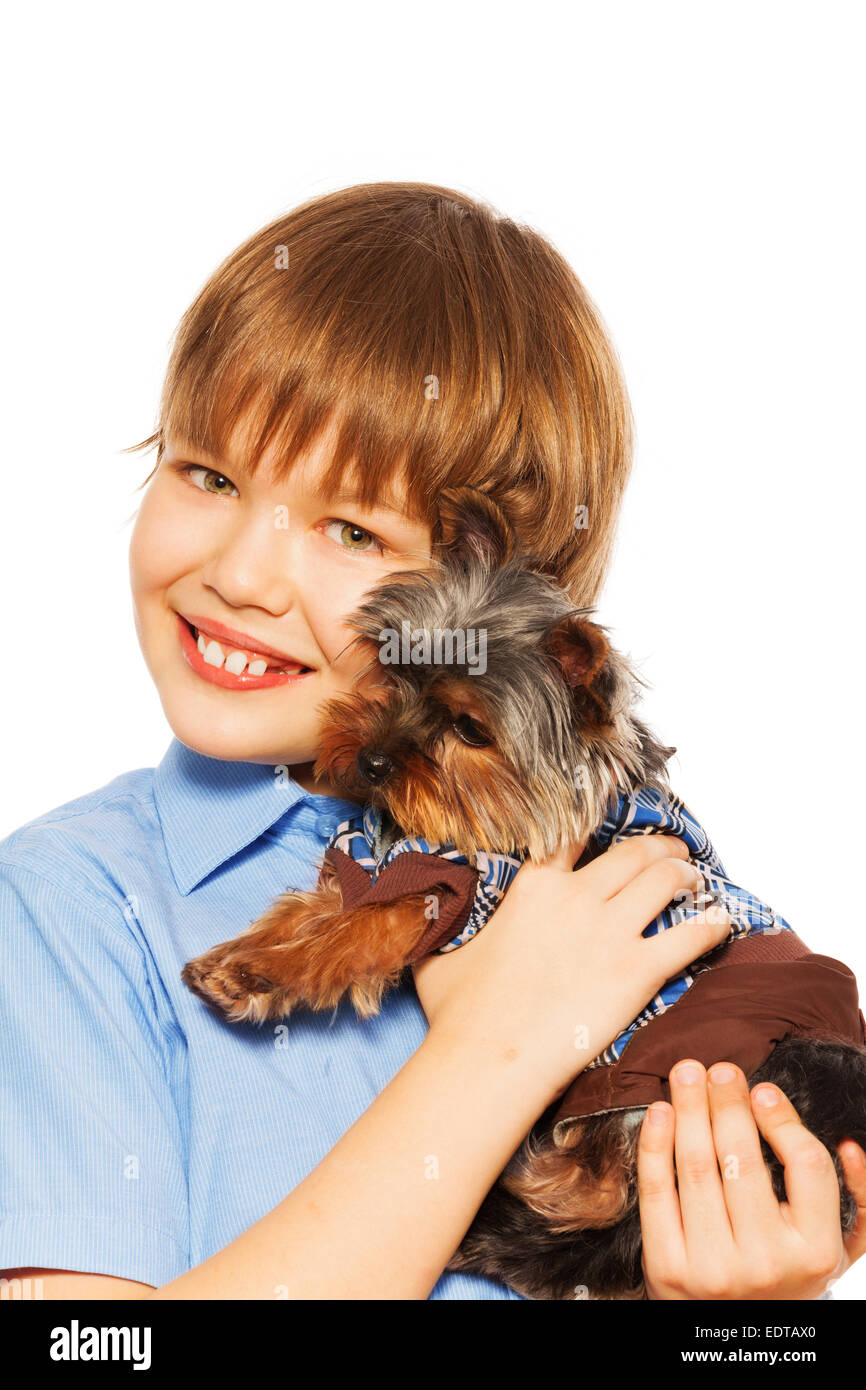 Yorkshire Terrier in pullover with smiling boy Stock Photo
