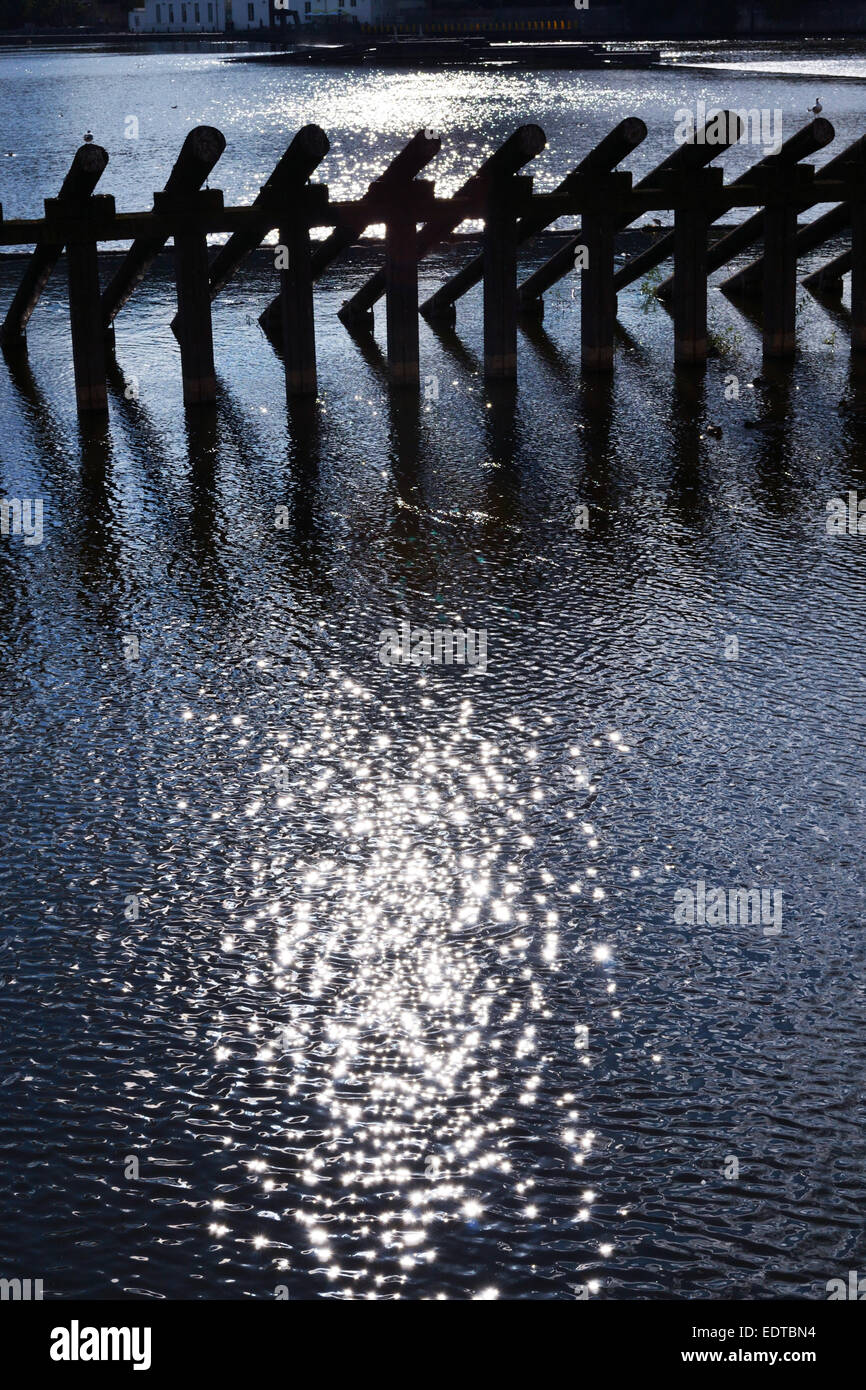 Row of weathered pier Stock Photo