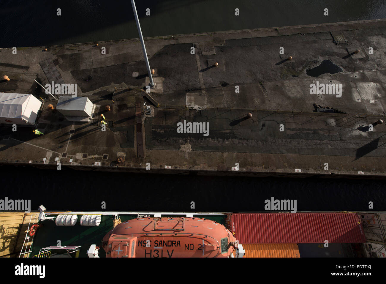 The Panama-registered container ship MSC Sandra, leaving Seaforth Docks, Liverpool, England, UK. Stock Photo