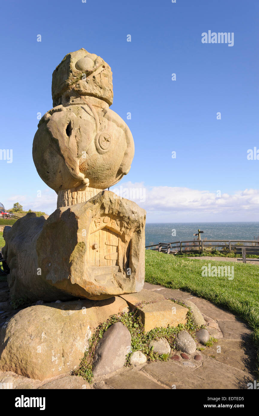 England, North Yorkshire, Robin Hood's Bay. The Millennium Statue commemorates the year 2000 Stock Photo