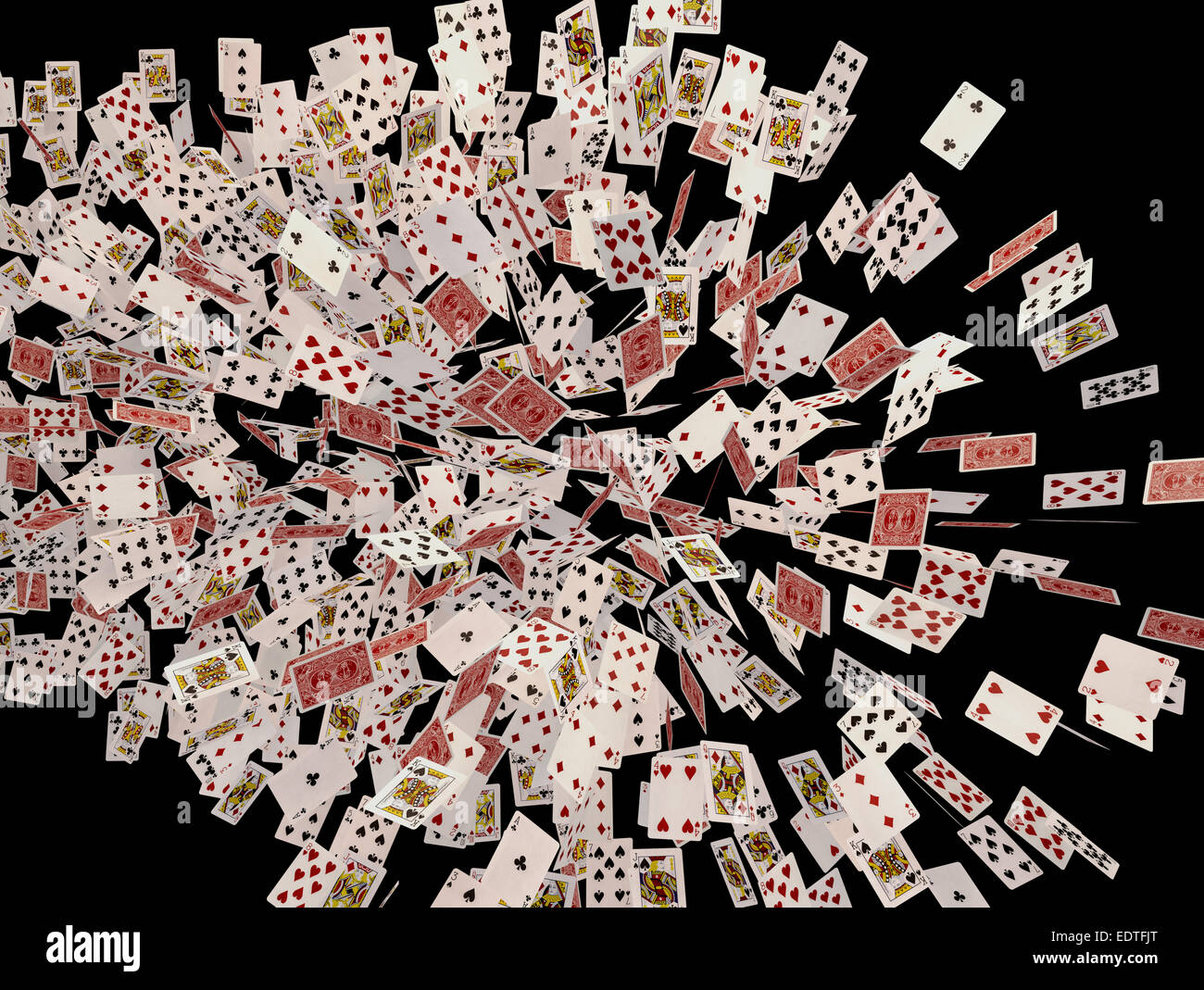 Playing cards flying over black background. Clipping path included. Stock Photo