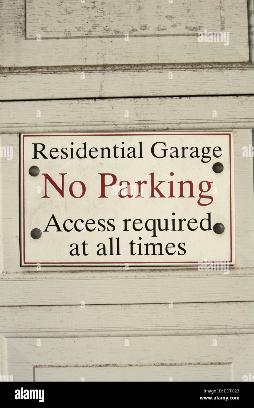no parking sign stating residential garage, access required at all times, hampton court, london england Stock Photo