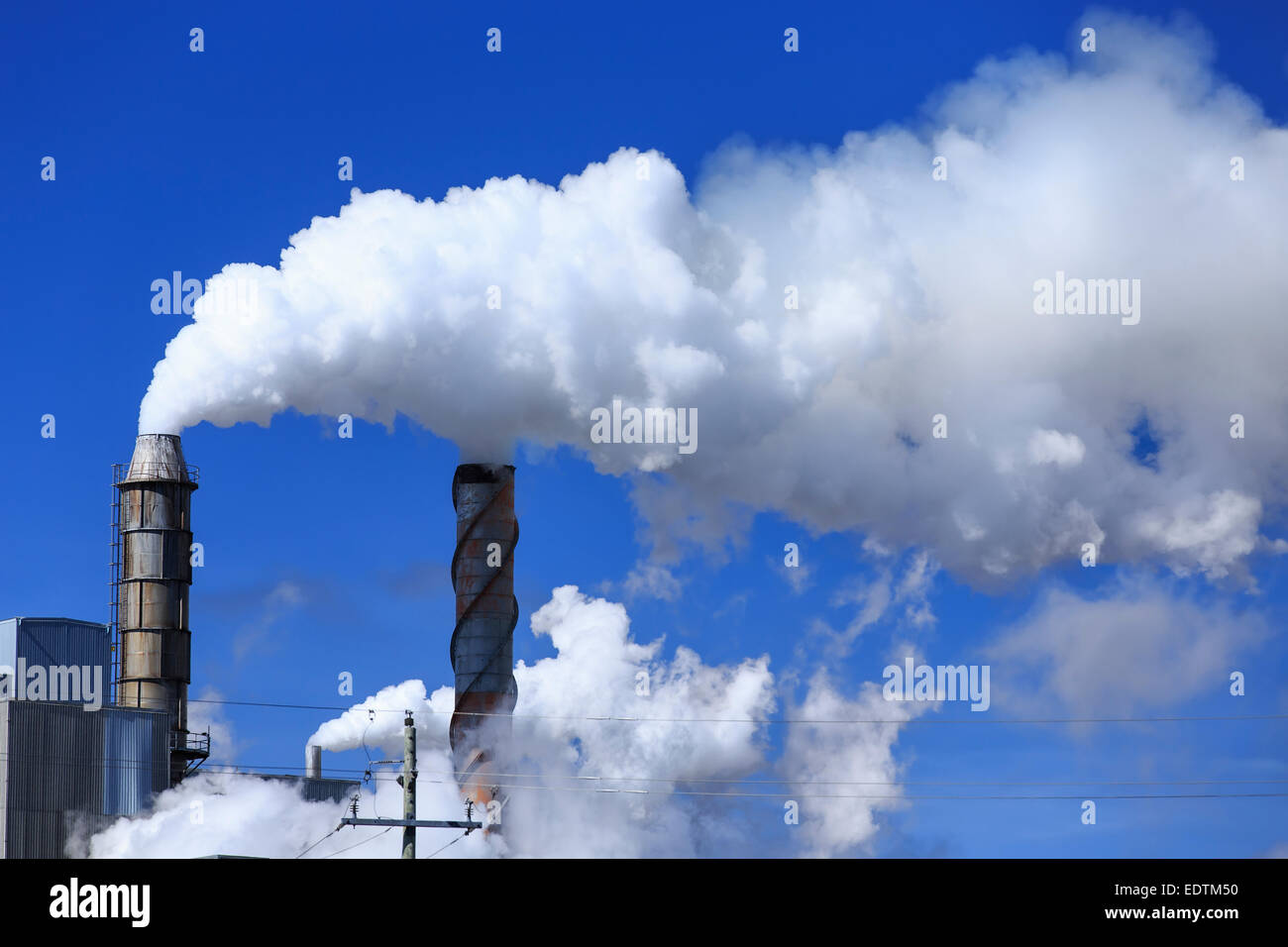 Air pollution from smokestacks at a pulp and paper mill, Terrace Bay, Ontario, Canada Stock Photo