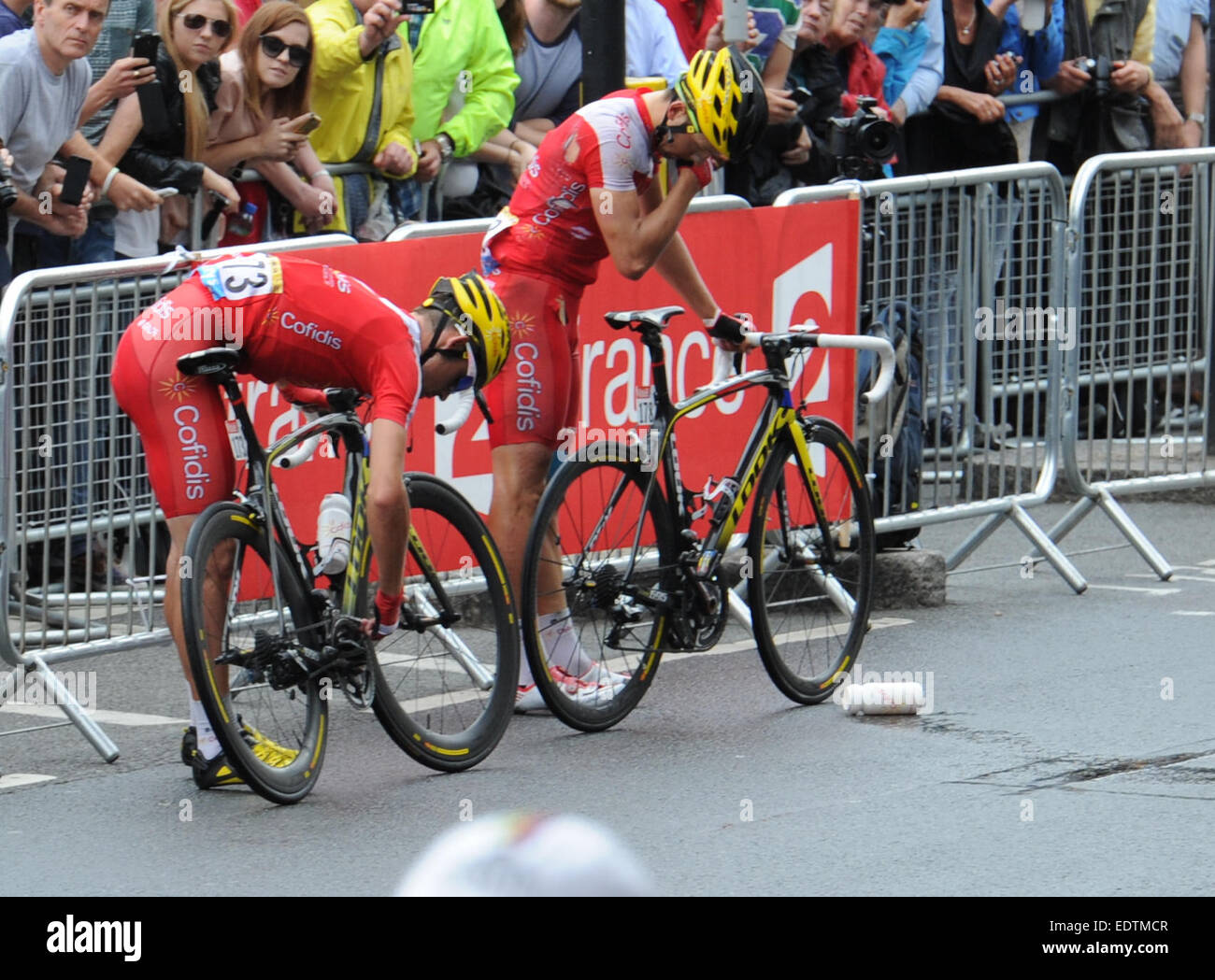 Two riders from the Cofidis Team collide during stage 3 of the Tour de ...