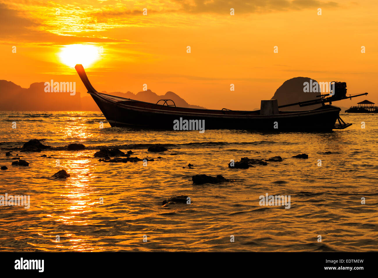 Sunrise at tip of boat at Trang , Thailand Stock Photo