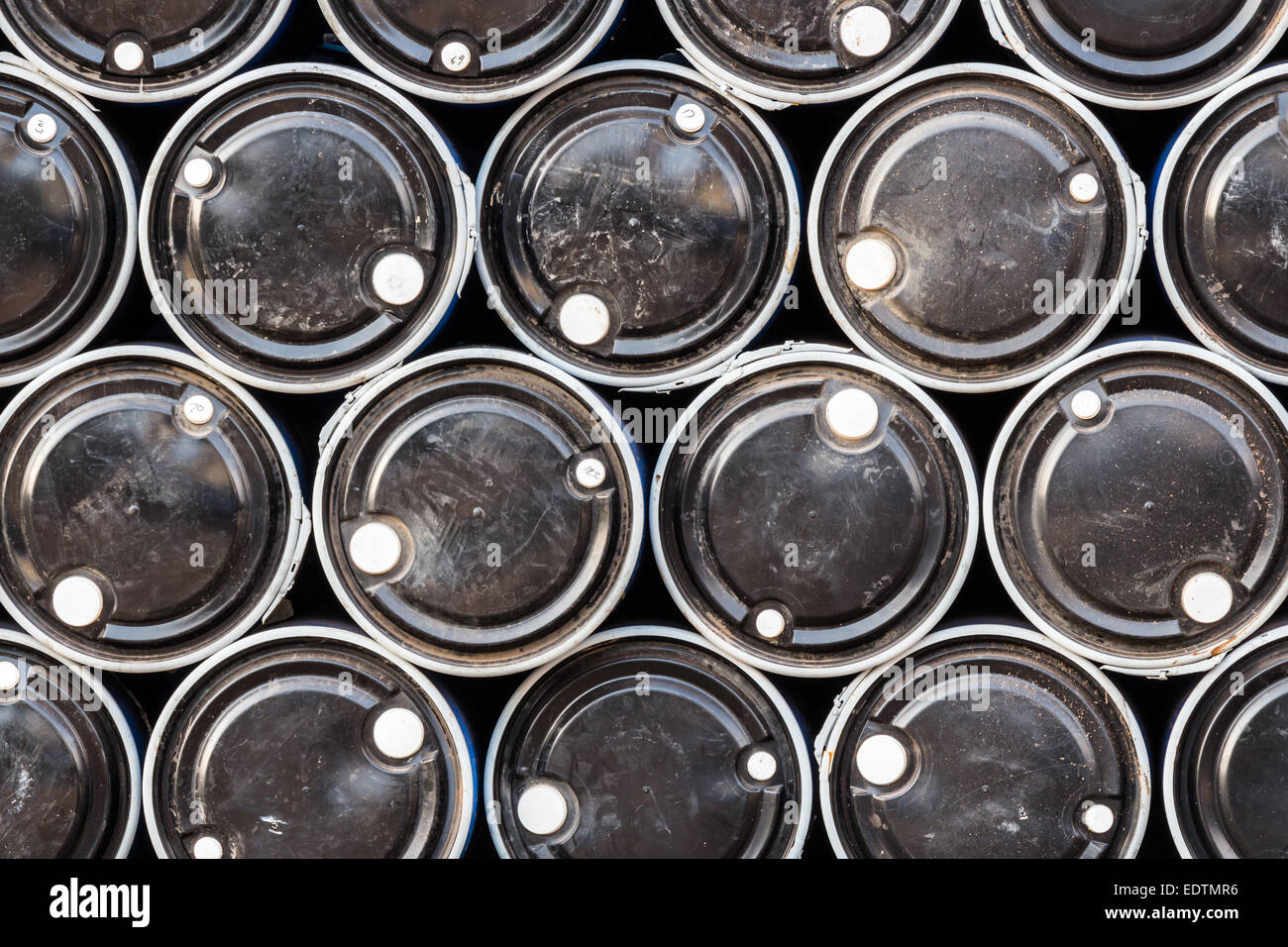 Black oil barrels background Stock Photo