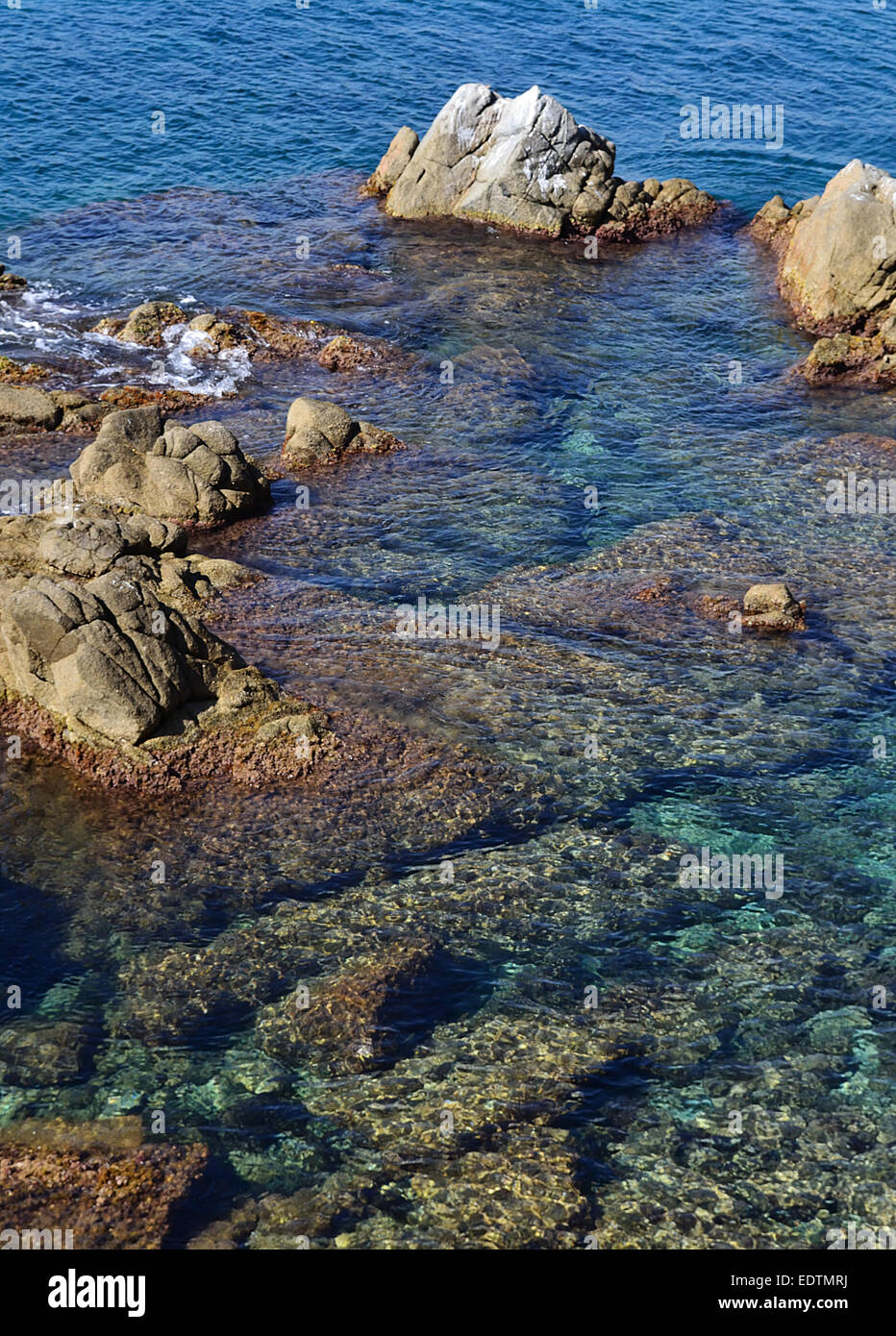 Stones and rocks at the edge of sea Stock Photo - Alamy