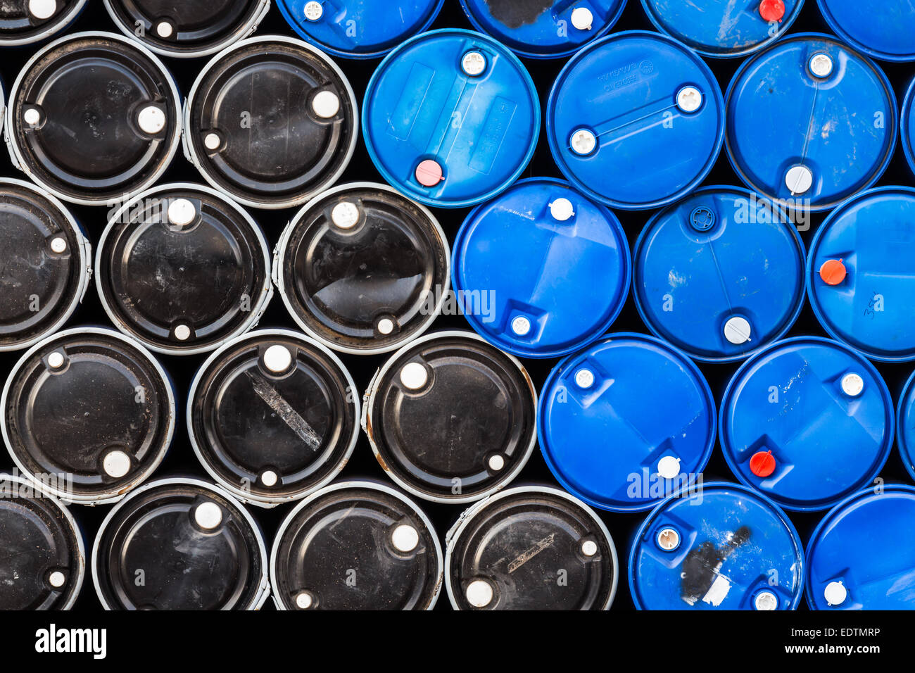 Blue and black oil barrels background Stock Photo