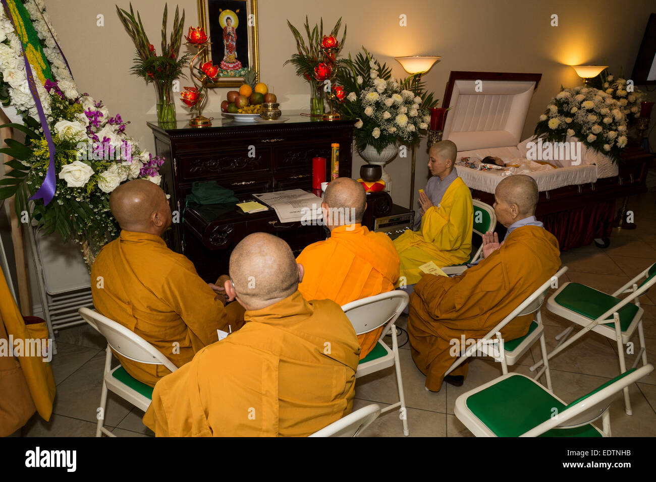 Buddhist monks, mourners, praying, Vietnamese funeral, memorial service