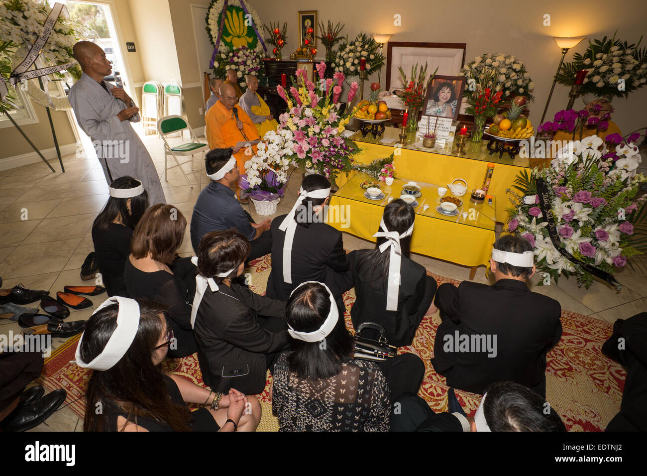 Family members, mourners at Vietnamese funeral service, Little Saigon district, city of Westminster, Orange County, California Stock Photo