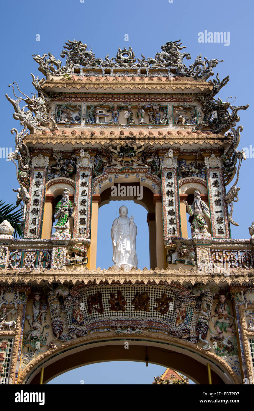 Vihn Trang Pagoda entrance top of ornate gate with statur Stock Photo