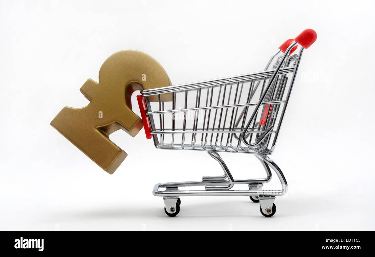 SHOPPING TROLLEY WITH POUND SIGN RE COMPANY PENSIONS  SUPERMARKETS INVESTMENTS PENSION POT SAVINGS RETIREMENT HOUSEHOLD BILLS UK Stock Photo