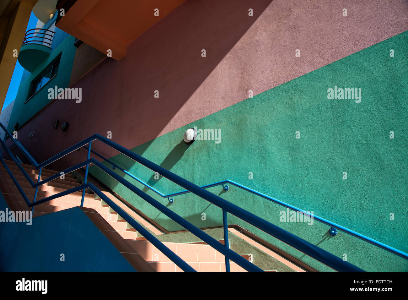 pastel coloured stairwell at Albufeira marina Stock Photo