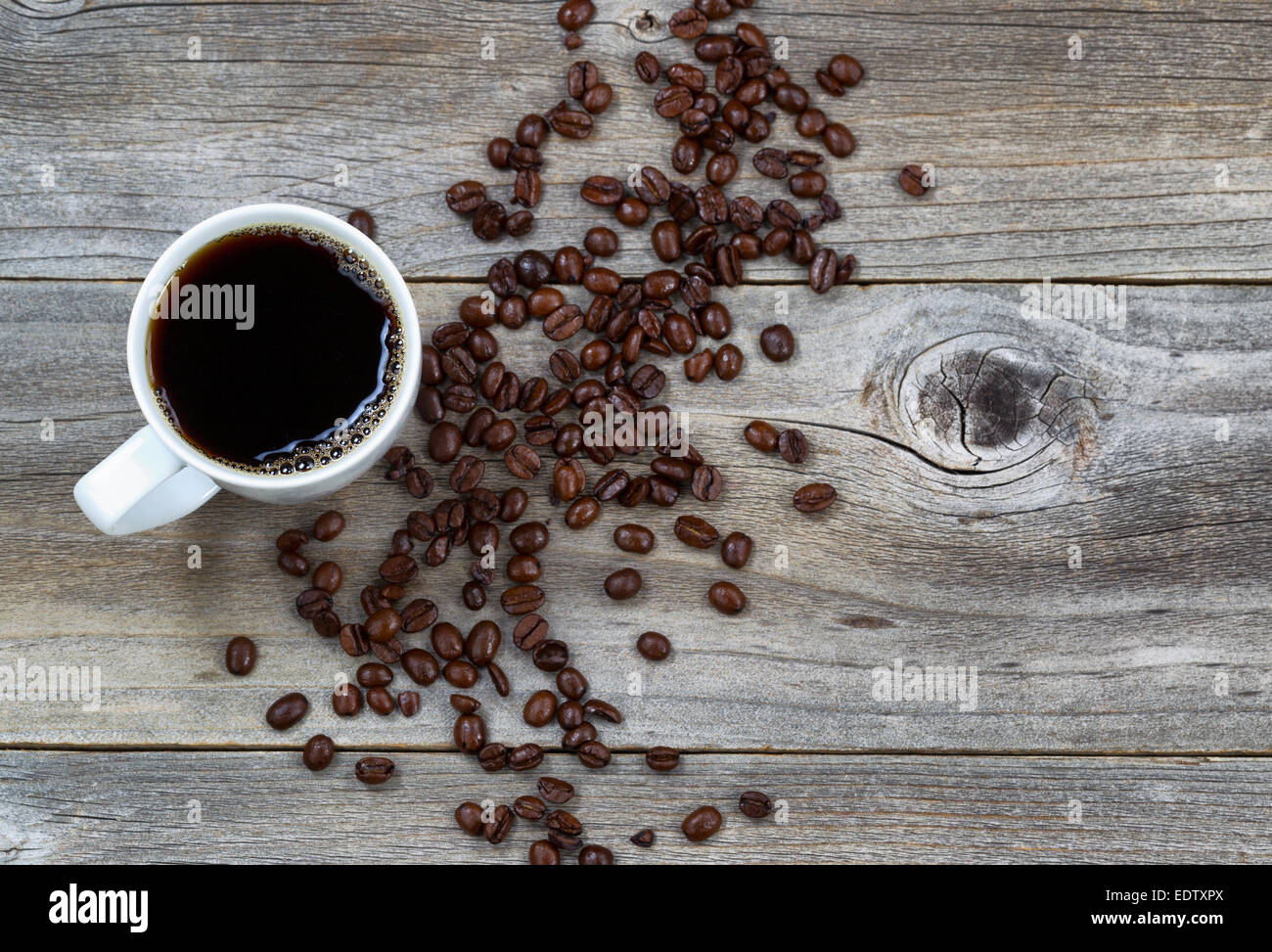 Top view image of fresh dark coffee and premium roasted whole beans on ...