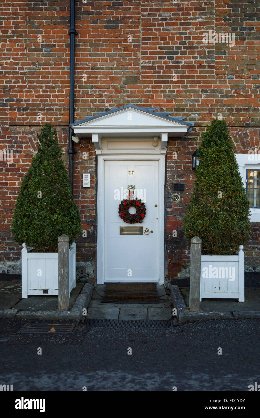 White traditional Georgian front door with brass knocker, handle and ... White traditional Georgian front door with brass knocker, handle and ...