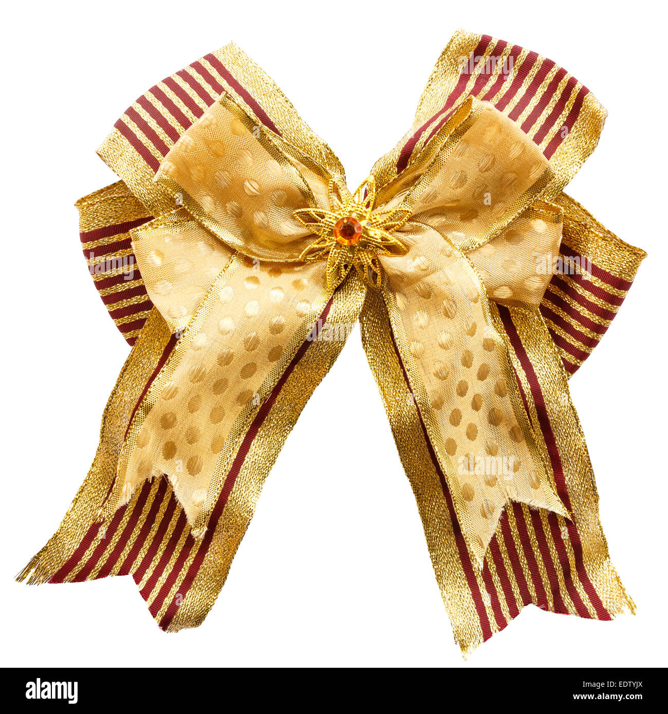 gold color bow with artificial gem on white background (isolated) Stock Photo