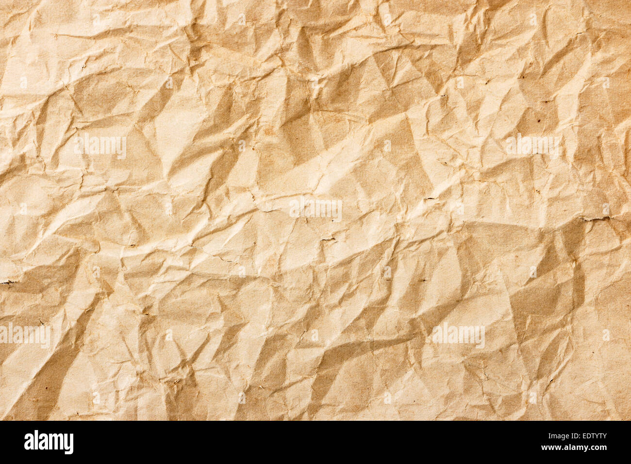 The texture of old brown crumpled paper Stock Photo