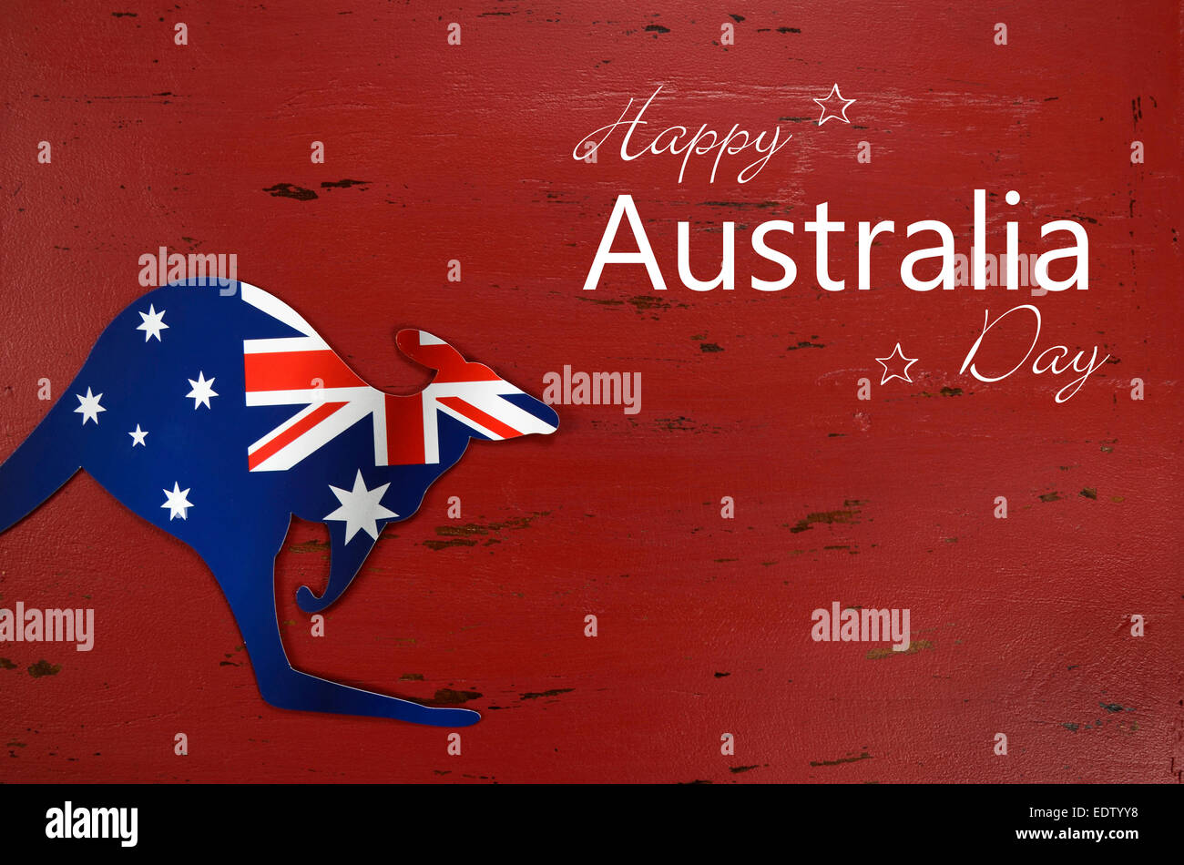 Australia Day with kangaroo shape Australian flag on red rustic recycled wood background with sample text Stock Photo - Alamy