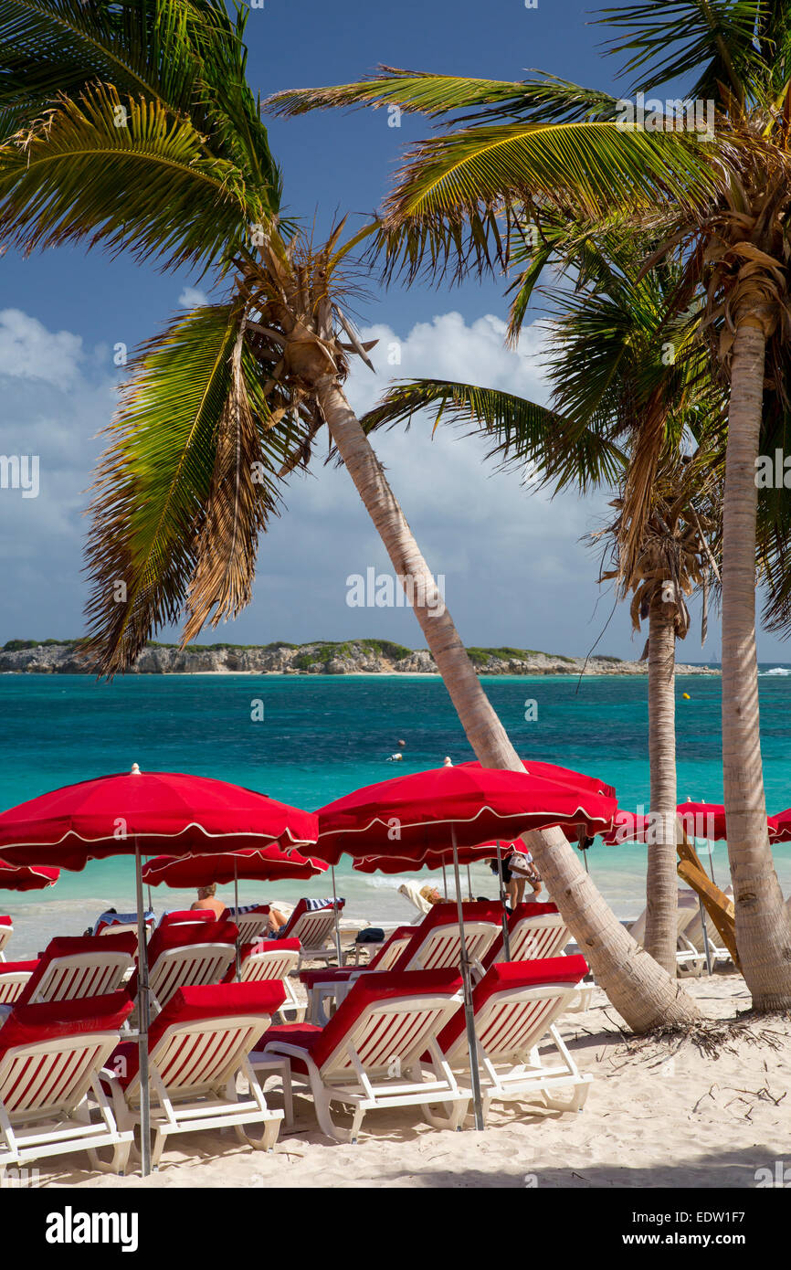 Umbrellas along Orient Beach, Saint Martin, West Indies Stock Photo
