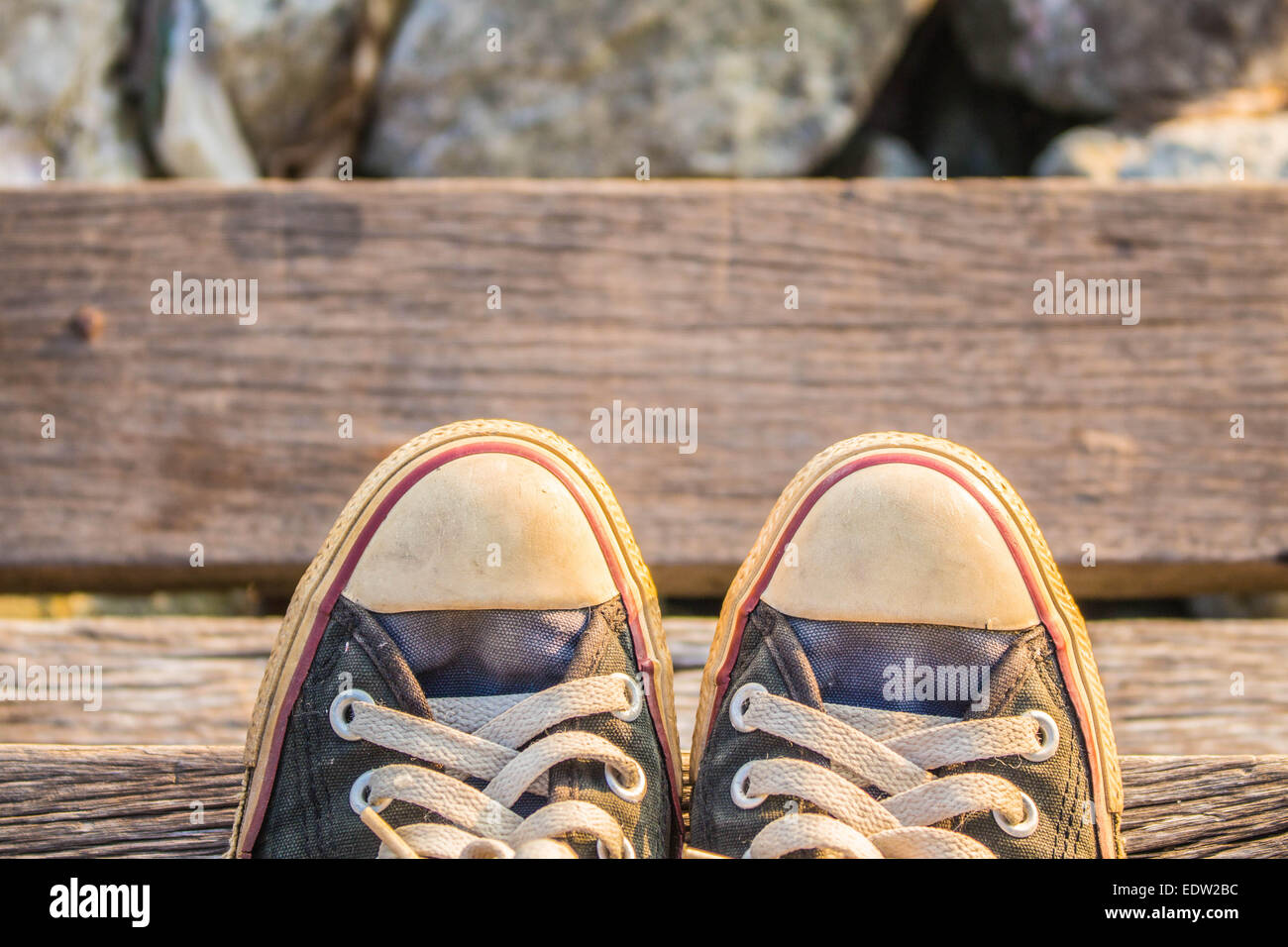 Sneakers are placed on a wooden staircase Stock Photo - Alamy