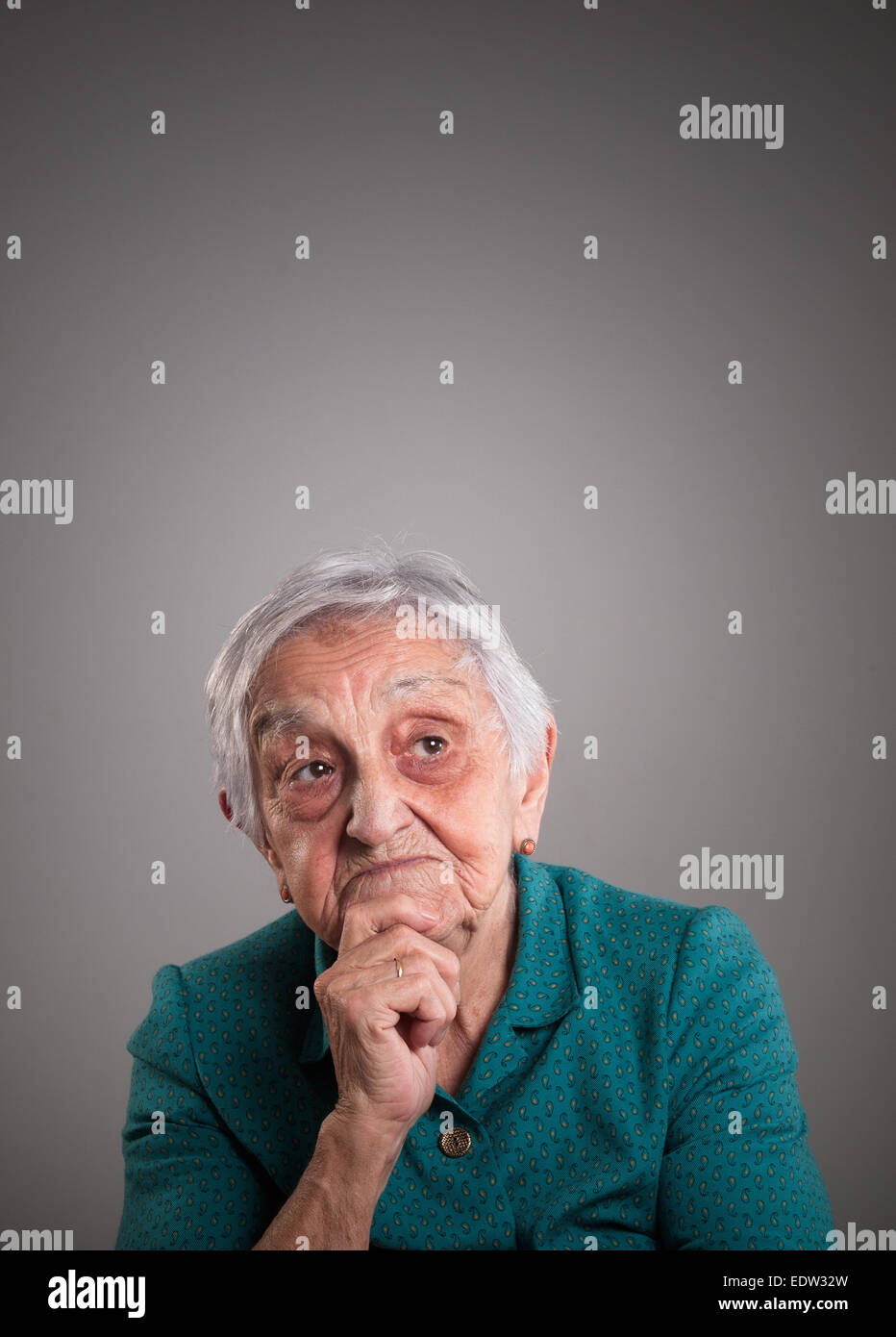 Old woman thinking hi-res stock photography and images - Alamy
