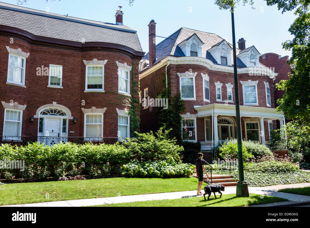Chicago Illinois,South Side,South Woodlawn Avenue,houses,homes,mansions,walking,dog dogs,resident,residents,visitors travel traveling tour tourist tou Stock Photo