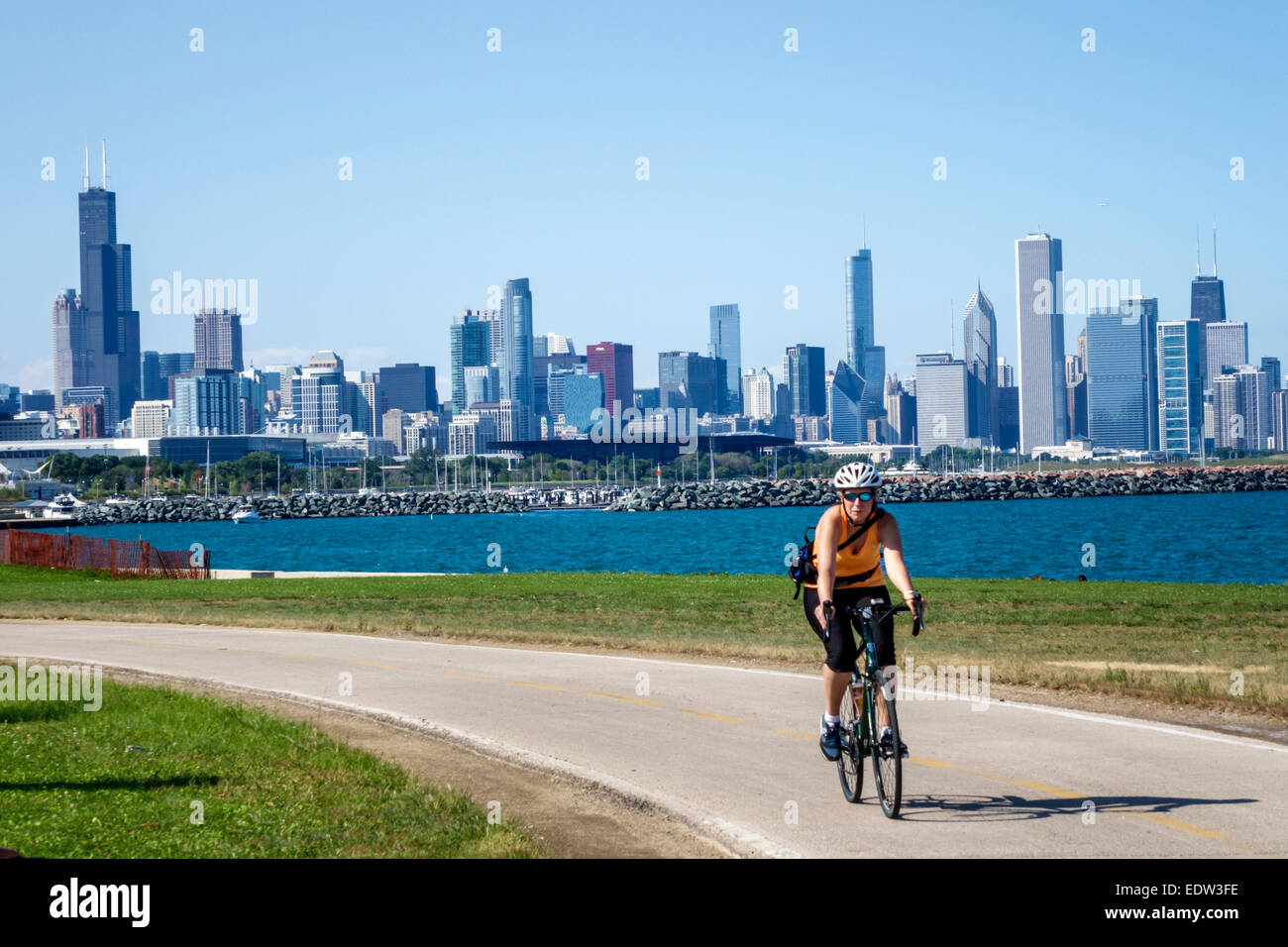 Chicago Illinois,South Side,Lake Michigan,39th Street Beach,Lakefront Trail,adult adults woman women female lady,biker bikers bicycle bicycles,bicycli Stock Photo