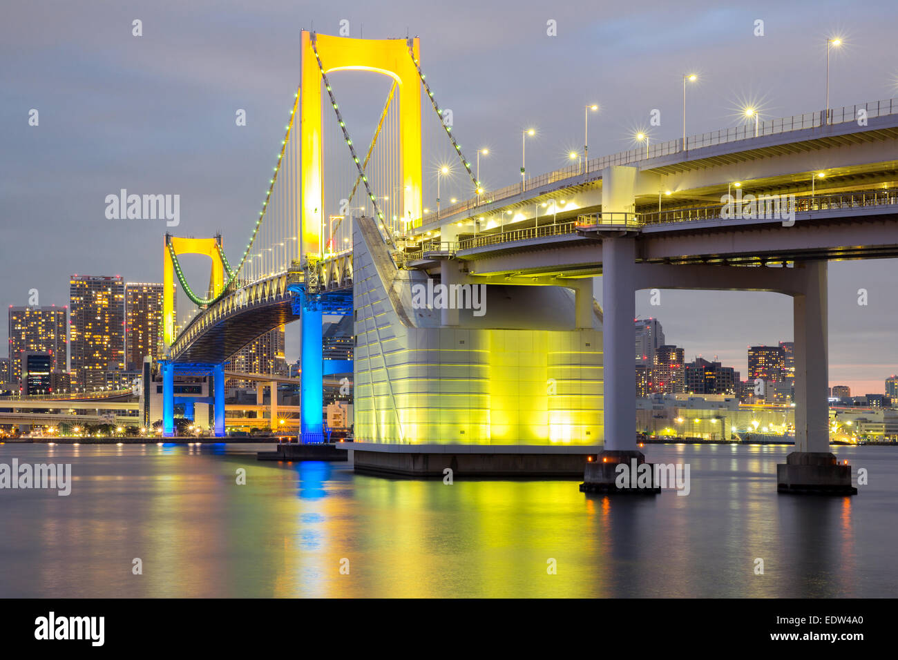 Rainbow bridge from Odaiba Tokyo at dusk in Japan Stock Photo