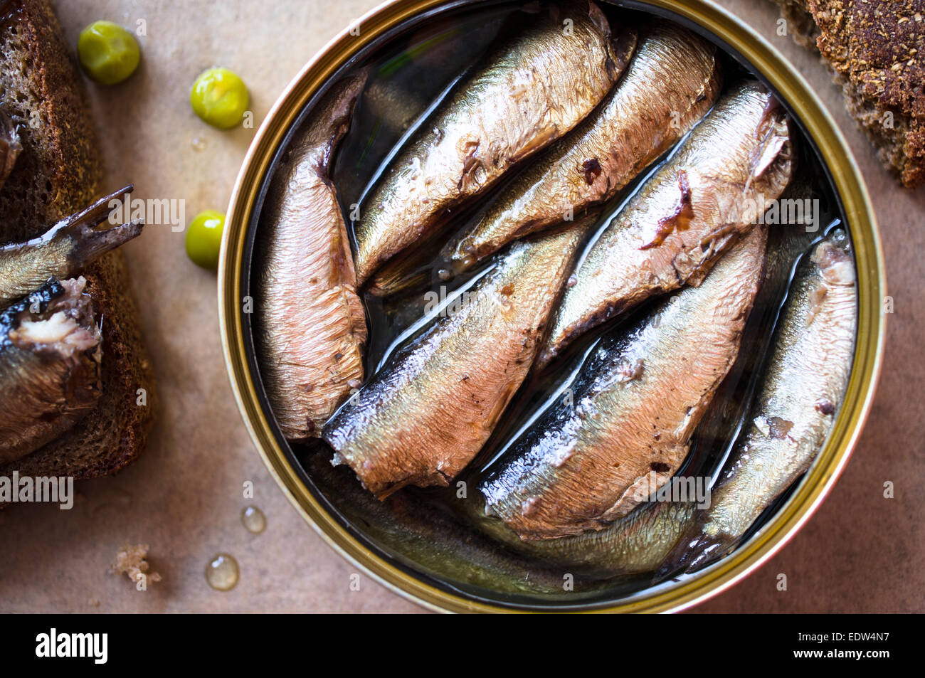 Tin can of sprats, sardines. Top view Stock Photo Alamy