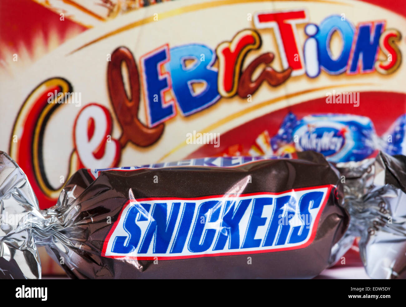 Snickers chocolate removed from box of Celebrations chocolates Stock Photo
