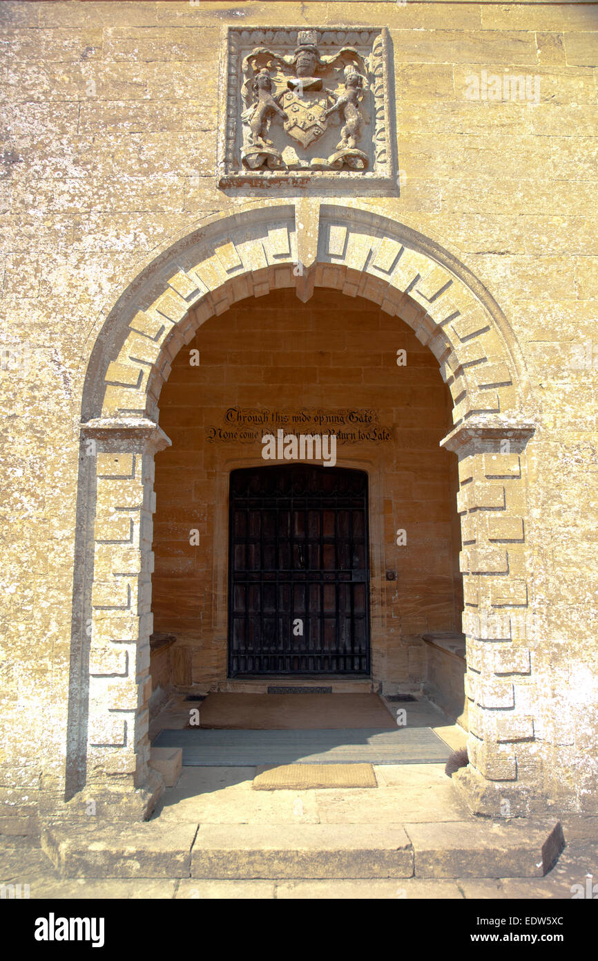 The main door, with inscription above, on the east front of Montacute